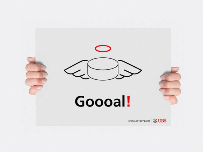 A UBS clap banner for the Spengler Cup.