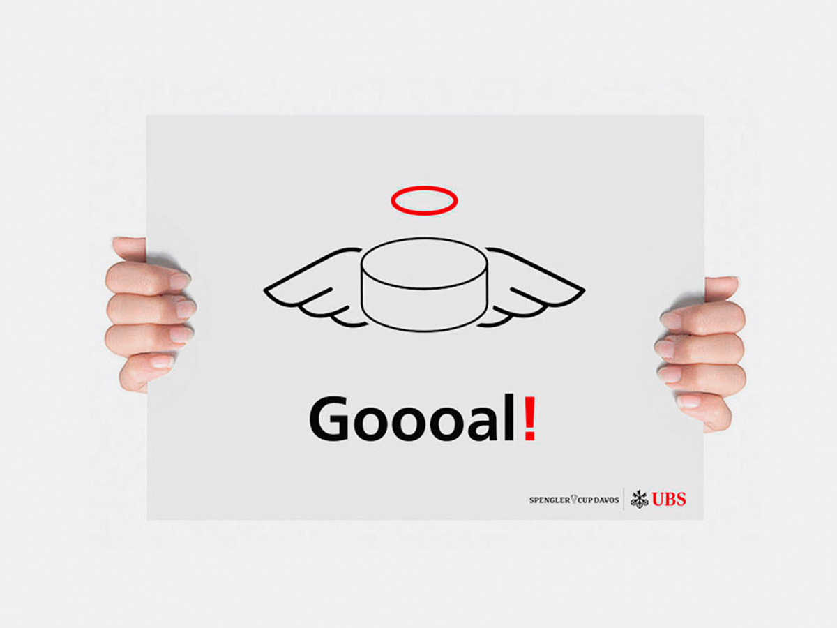 A UBS clap banner for the Spengler Cup.